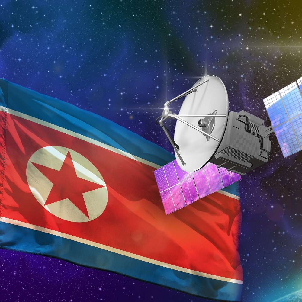 Satellite in the space with the North Korean flag